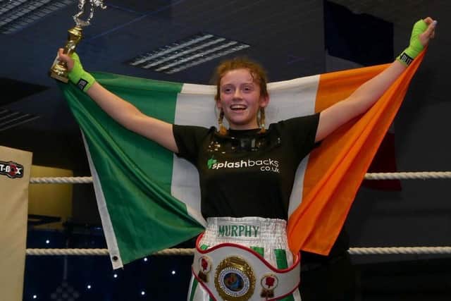 Caitlin pictured celebrating her victory in the Six Nations title fight in Scotland last weekend.