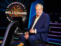 Jeremy Clarkson, sat in the host’s chair on set of Who Wants to be a Millionaire? (Credit: Stellify Media)