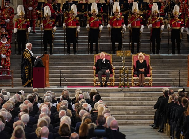 <p>King Charles III and the Queen Consort listen to Speaker of the House of Lords Lord McFall of Alcluith (left) at Westminster Hall. Credit: PA</p>