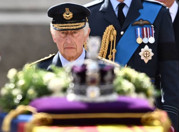 <p>King Charles III walks behind the coffin of Queen Elizabeth II. Photo: Getty</p>