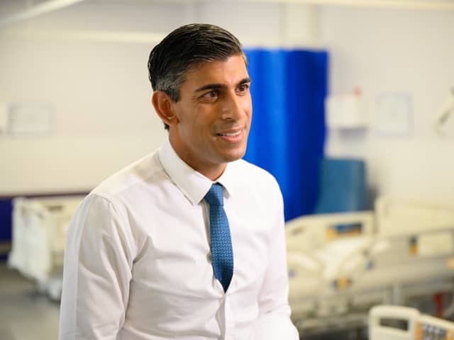 Prime Minister Rishi Sunak speaks with members of the media as he visits Croydon University hospital on October 28.