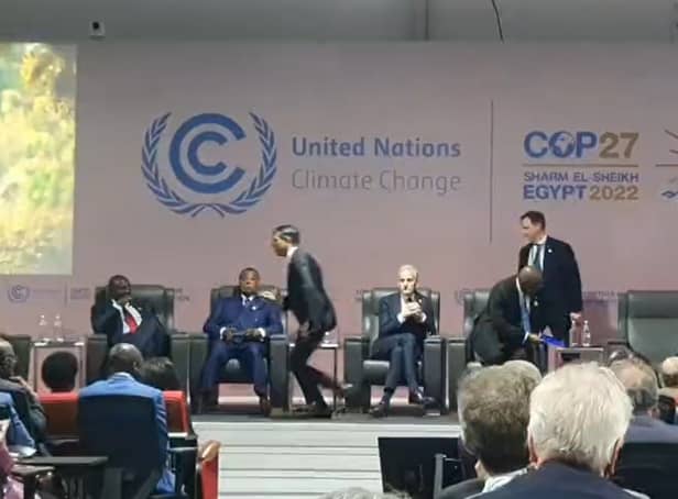 <p>Prime Minister Rishi Sunak is seen running off the stage at an event at COP27 in Egypt.</p>