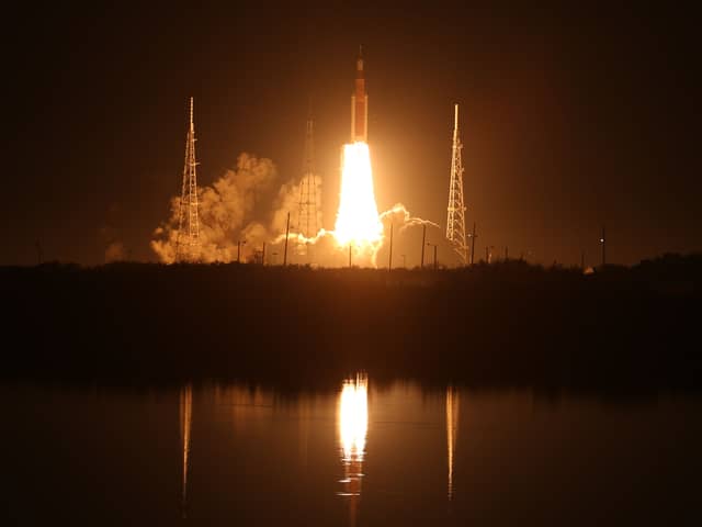 Artemis I Space Launch System (SLS) rocket, with the Orion capsule attached, launches at NASA's Kennedy Space Center on November 16