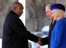 South Africa's President Cyril Ramaphosa is greeted by Britain's King Charles III and Britain's Camilla, Queen Consort 