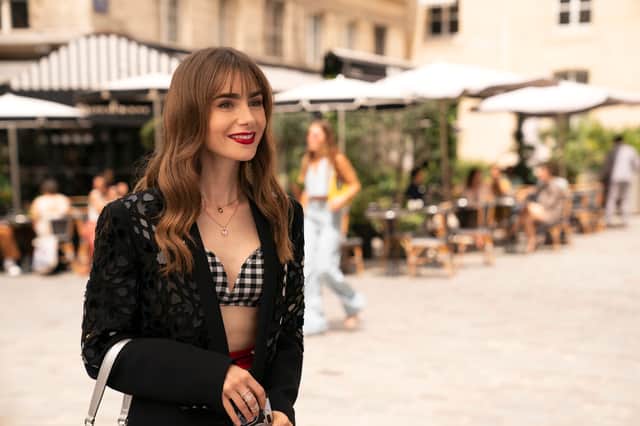 Lily Collins as Emily in Emily in Paris Season 3 (Credit: STÃPHANIE BRANCHU/NETFLIX)