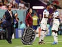 Marcus Rashford and Bukayo Saka of England are substituted during the FIFA World Cup Qatar 2022 Group B match between England and USA at Al Bayt Stadium on November 25, 2022 in Al Khor, Qatar. (Photo by Elsa/Getty Images)