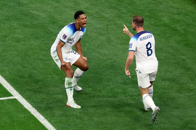 Jordan Henderson and Jude Bellingham celebrates after England took the lead against Senegal (Photo by Alexander Hassenstein/Getty Images)