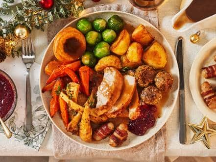 Sainsbury’s has created an “inflation-busting” Christmas dinner to help families enjoy a slap-up meal despite the challenges of the cost of living crisis. 