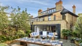 One lucky person is guaranteed to win a stunning North London town house worth over £3,000,000 - along with £100,000 in cash - as part of a new prize draw. 