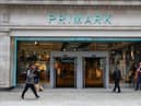 A pedestrian walks past a Primark store on Oxford Street.