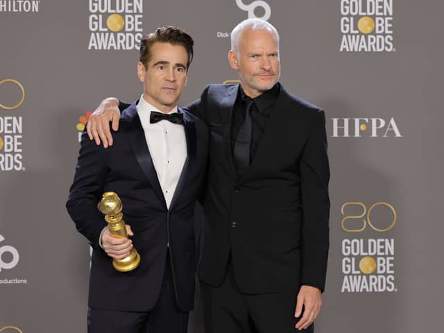  (L-R) Colin Farrell and Martin McDonagh, winners of Best Picture - Musical/Comedy for "The Banshees of Inisherin", pose in the press room during the 80th Annual Golden Globe Awards