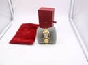 A Cartier watch, which was discovered in a bag of donations to the British Heart Foundation, has sold for almost £10,000 on eBay.