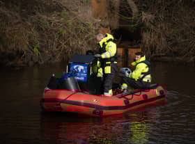 Specialists search the River Wyre this morning (February 6).