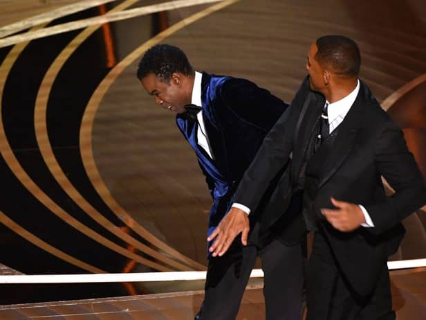 Will Smith slapped host Chris Rock after he made a joke about Jada's shaved head (Pic:Getty)