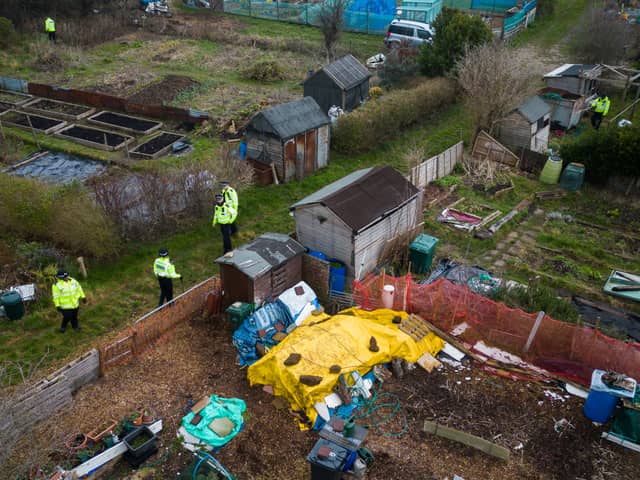 A police search team works through an allotment area as they continue to search for the missing baby in Brighton (Photo by Leon Neal/Getty Images).