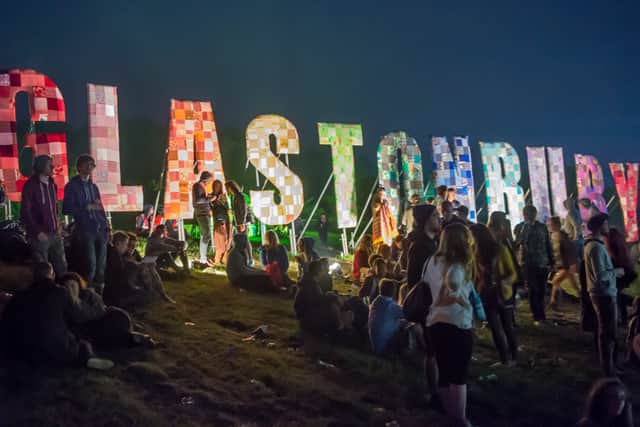 Festival-goers enjoy the atmosphere prior to the 2013 Glastonbury Festival at Worthy Farm. (Photo by Ian Gavan/Getty Images)