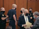 Disgraced former US lawyer Alex Murdaugh (centre) was convicted of the murder of his wife and son. (Photo: courtesy of Netflix)