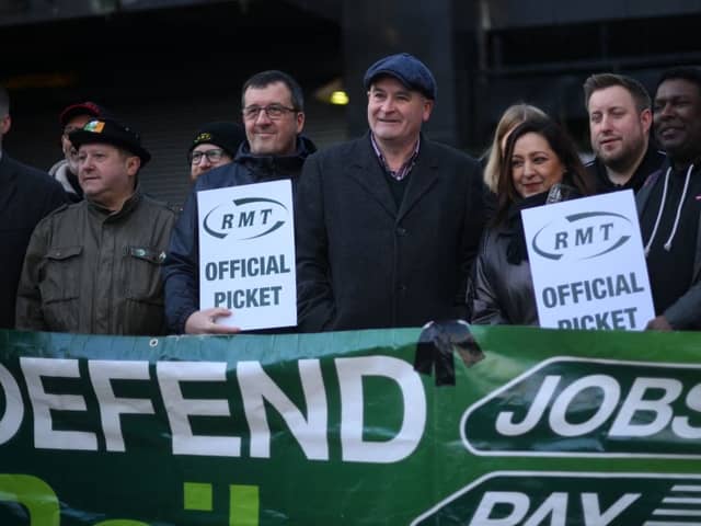 RMT general secretary Mick Lynch (centre) on an RMT picket line during January’s strike (Photo by DANIEL LEAL/AFP via Getty Images)