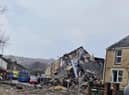 The person previously reported as missing after a suspected gas explosion in Swansea has been found dead.