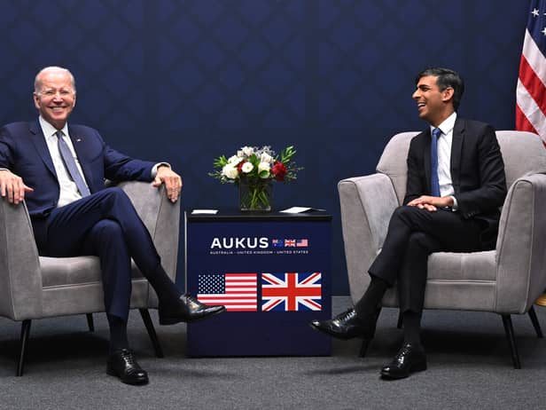 US President Joe Biden and British Prime Minister Rishi Sunak participate in a bilateral meeting during the AUKUS summit on March 13, 2023 in San Diego, California. President Biden hosts British Prime Minister Rishi Sunak and Australian Prime Minister Anthony Albanese in San Diego for an AUKUS meeting to discuss the procurement of nuclear-powered submarines under a pact between the three nations. (Photo by Leon Neal/Getty Images)
