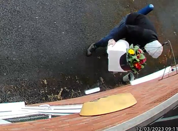 <p>Owner Kim Hughes was left “mortified” when she watched back the footage and saw the hooded man walking off with the box filled with letters to dead relatives. </p>
