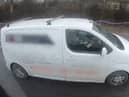 Motorists caught on camera watching a film while driving