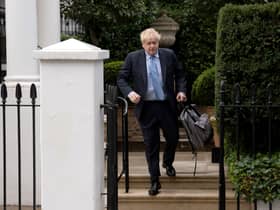Former PM Boris Johnson leaving his home for the Commons Privileges Committee