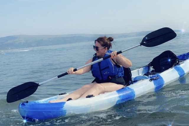 Anne-Marie kayaking.