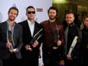 Take That fans have been left excited after a series of posts have hinted that the group could reunite 