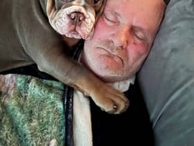 Ain’t nothing but a hound, Doc: David Lindsay with his British Bulldog puppy, Harley. 
