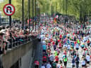 Spectators line the streets at Blackfriars to watch Marathon runners