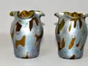 A pair of vases bought by a Staffordshire mum for just 8 at a Spanish car boot sale are set to sell at auction in Lichfield for hundreds of pounds. 