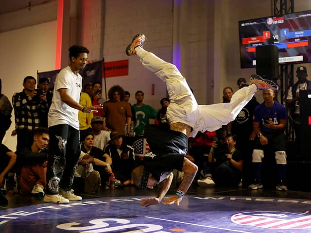 B-Boy Gravity, also known as Miguel Rosario, competes in the Semifinal battle against B-Boy Tahu during the Breaking For Gold USA regional competition at Industria on April 22
