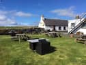 The gastropub is being sold for £399,000 on an island famed for its white sand beaches. It has a gigantic beer garden and a rustic bar and was refurbished during the pandemic.  (Courtesy Alice Bagley / SWNS)