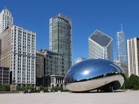 The Cloud Gate sculpture, popularly known as the bean, with Chicago's skyline