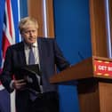 Boris Johnson to stick with ‘Plan B’ Covid measures despite mounting pressures (Photo by JACK HILL/POOL/AFP via Getty Images)
