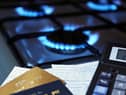 Gas stove, bank cards and calculator 