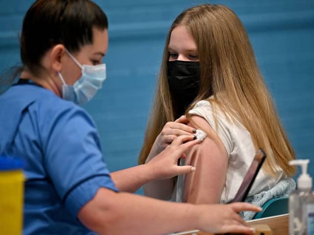 Teenager Eve Thomson receives a Covid-19 vaccination in Barrhead, Scotland (Photo: Jeff J Mitchell/Getty Images)