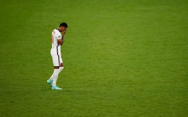 Marcus Rashford reacts after missing England's third penalty in the penalty shoot out during the UEFA Euro 2020 Championship Final against Italy (Photo by John Sibley - Pool/Getty Images)