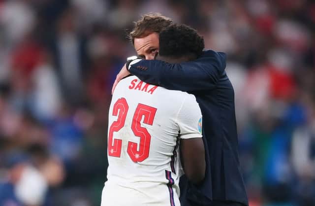 Bukayo Saka is consoled by Gareth Southgate following defeat in the Euro 2020 Championship Final (Photo: Getty Images)