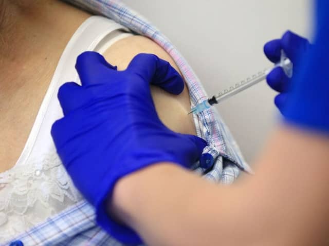 Mixing vaccines can results in an increase of symptoms including chills and a fever (Getty Images)