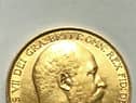 The treasure trove found scattered across the home included a gold Edward VII £2 coin from 1902. 