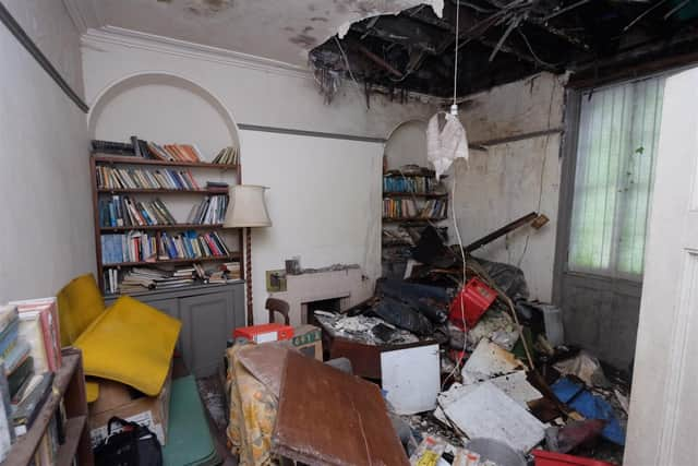 The ceiling in the property’s sitting room has fallen in.