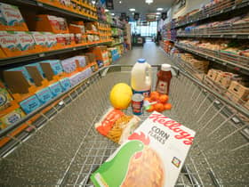 A shopping trolley filled with groceries from Aldi, which has been named the UK’s cheapest supermarket for 12 months in a row.
