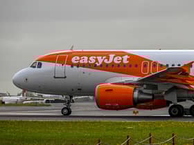 EasyJet has defended its policy of letting its plane crew include their preferred pronouns on name badges despite criticism. (Photo by Horacio Villalobos#Corbis/Getty Images)