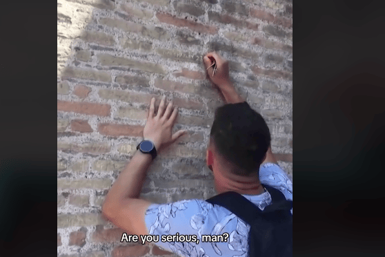 Italian police launch manhunt for a UK tourist who defaced walls of Colosseum