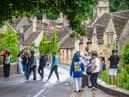 Tourists in Castle Combe, Wiltshire.