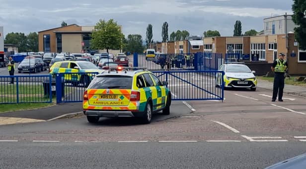 A teenage boy has been arrested after a teacher was stabbed at a secondary school in Tewkesbury, Gloucestershire 