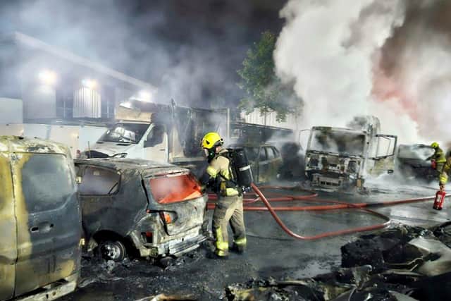 More than 50 cars have been torched in a suspected arson attack overnight