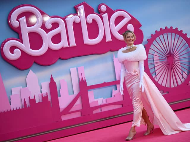 Australian actress Margot Robbie poses on the pink carpet upon arrival for the European premiere of “Barbie” in central London.